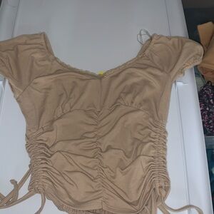 Tan shirt size small